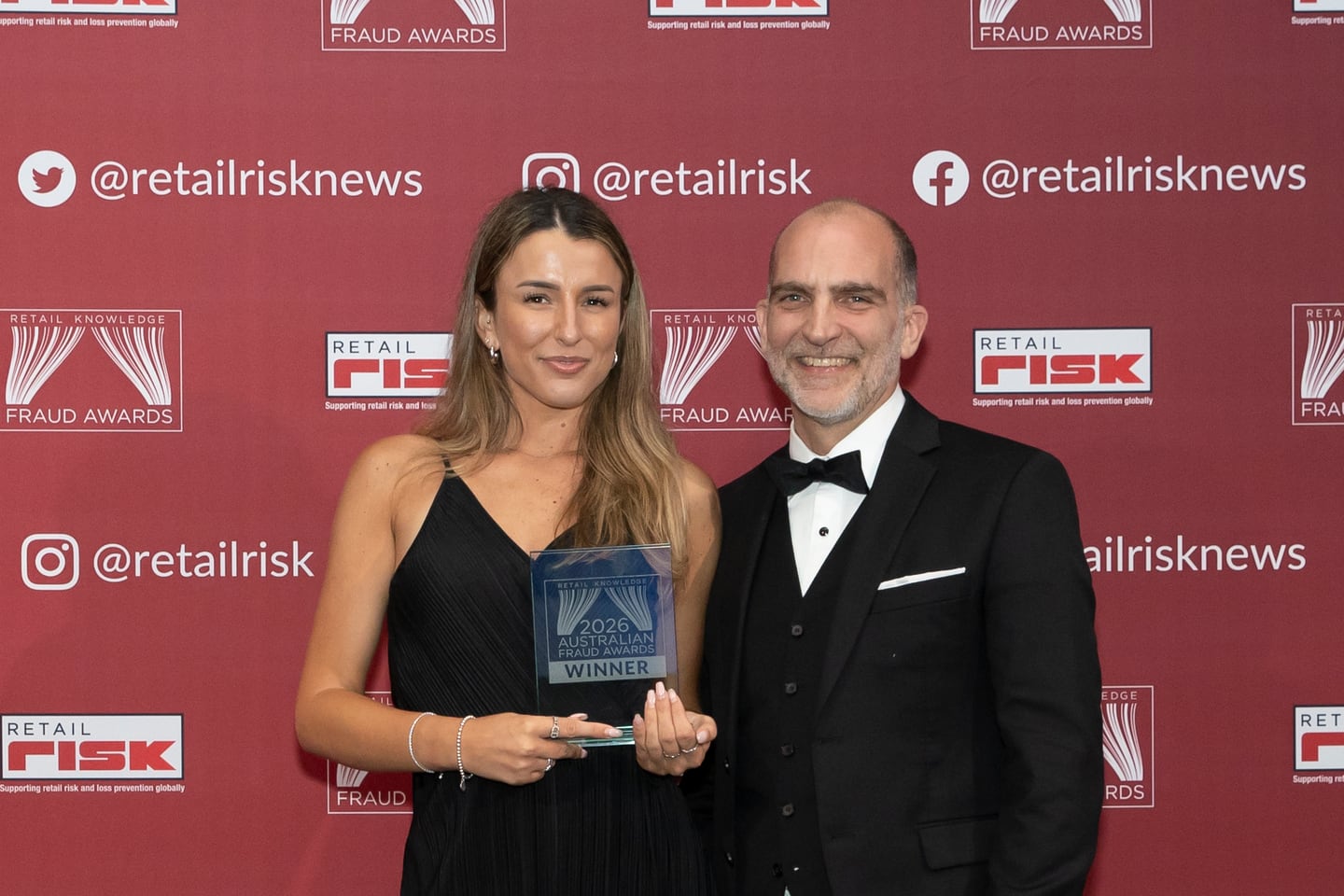 Chanel Kaczmarek holding the 2026 Australian Fraud Awards winner trophy for Retail Risk Rising Star of the Year