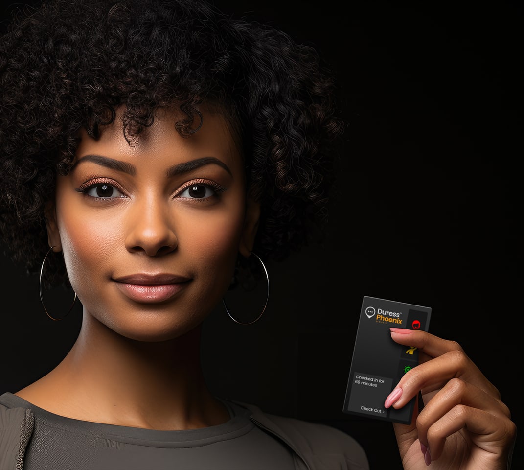 A retail worker holding a Duress Phoenix duress card