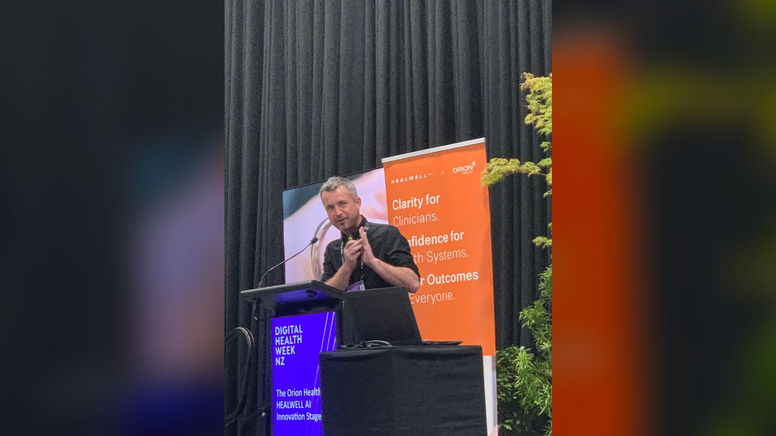 Trav Heaven presenting on the Innovation Stage at Digital Health Week NZ 2025 in Christchurch